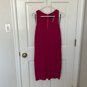 Magenta knee-length dress with racer-back and gold zipper details